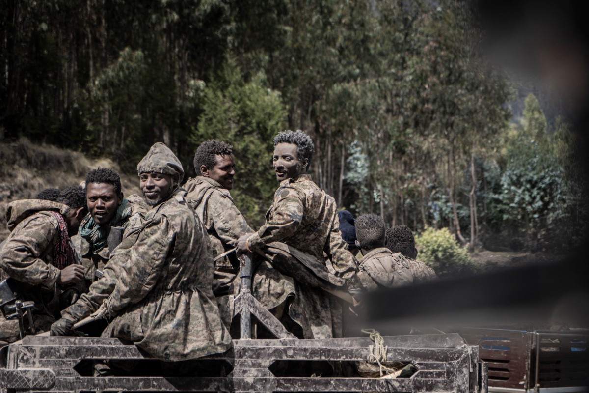 Voices from Ethiopia's war-scarred Tigray - Members of the Ethiopian National Defense Force (ENDF) are seen on a truck in Shewa Robit, Ethiopia, on December 5, 2021.  (Photo by Amanuel Sileshi / AFP)