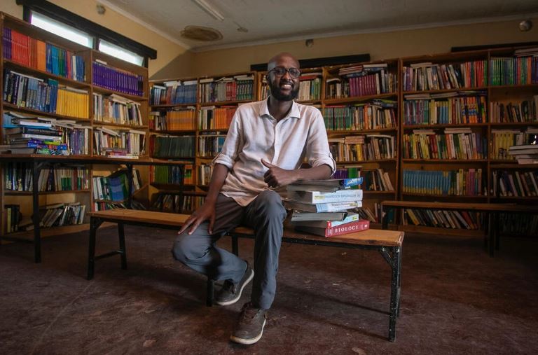 Somali-born champion of refugee education wins top UN award - The 2023 Nansen Refugee Award winner Abdullahi Mire, in one of the libraries he founded in Kenya’s Dadaab refugee camp. (Photo: UNHCR/Anthony Karumba)