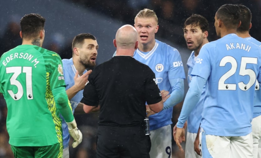 Man City charged by FA for failing to control players surrounding referee against Tottenham