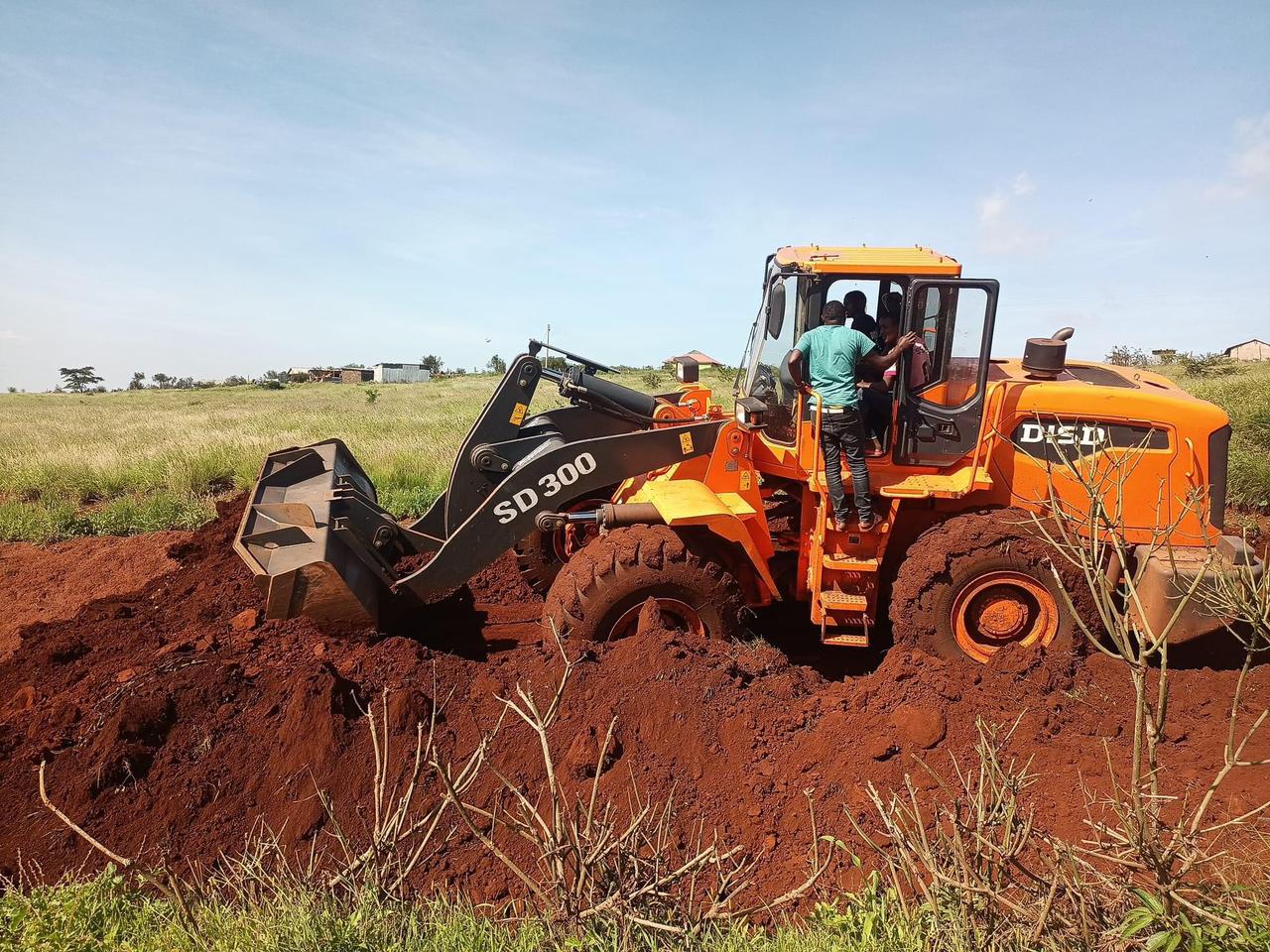 Reprieve for stranded Garissa passengers amid ongoing road repair works - One of KeNHA tractors repairing road sections that were affected by floods.