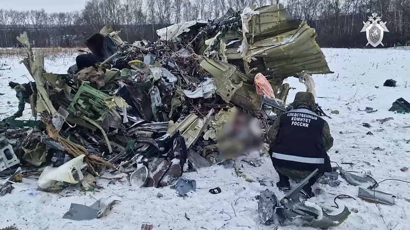 Uncertainty hangs over Russia's account of plane crash that killed Ukrainian soldiers - This grab taken from a handout footage released by the Russian Investigative Committee on January 25, 2024 shows what investigators say is the Russian IL-76 military transport plane crash site in the Belgorod region. (AFP) 