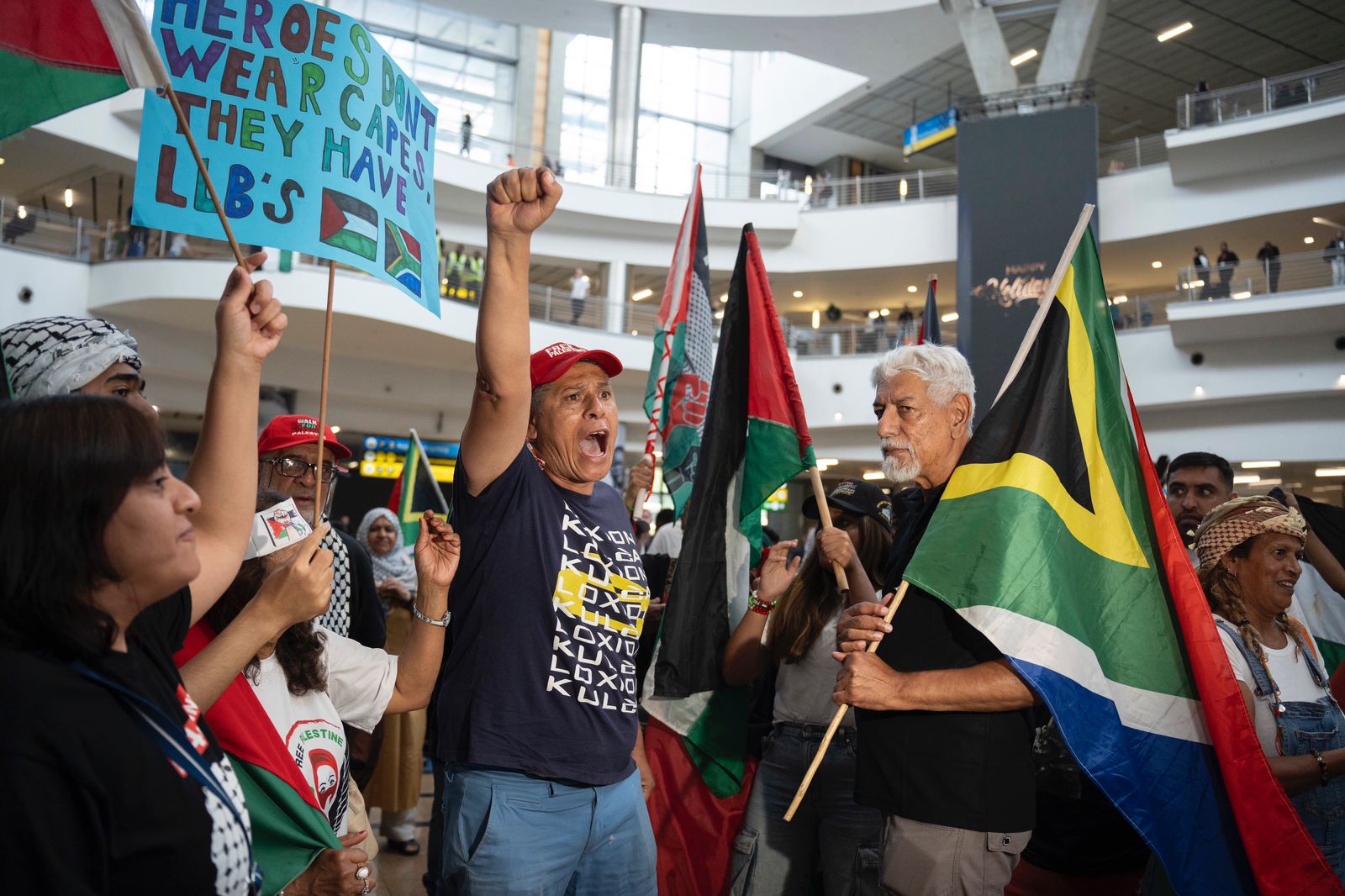 Hero's welcome home for South African lawyers challenging Israel on genocide claims