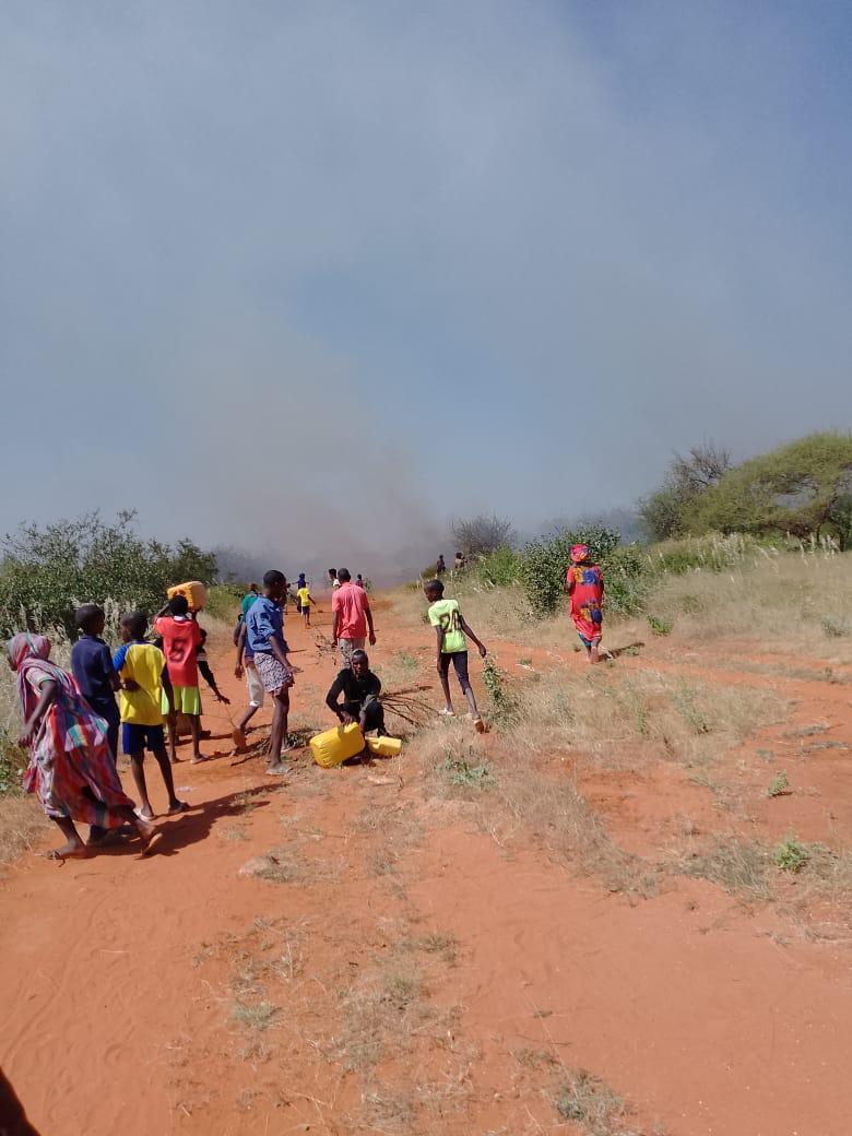 Udole residents battling rapidly spreading wildfire