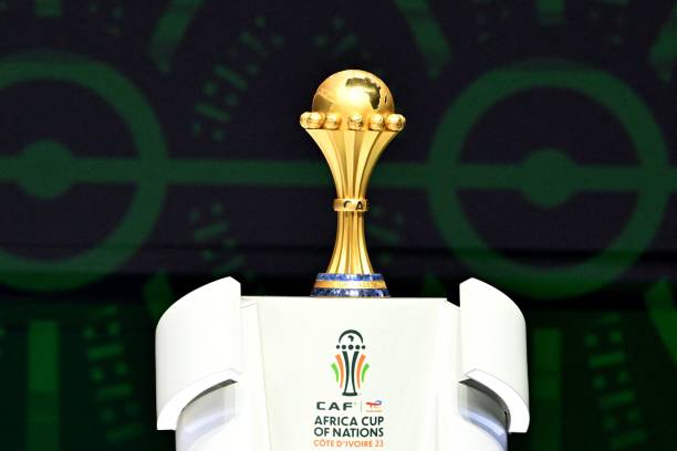 Africa Cup of Nations winners to receive record Sh1 billion prize - The trophy of the Africa Cup of Nations (CAN) is pictured on the stage during the CAN 2024 official draw at Parc des Expositions in Abidjan, southeastern Ivory Coast, on October 12, 2023. (Photo: Issouf SANOGO/AFP)