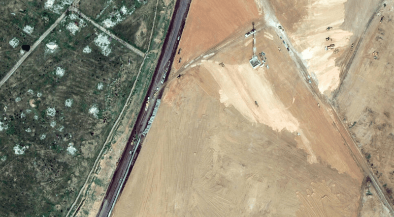 Egypt building 'enclosure' for displaced Gazans in Sinai: report - A satellite picture shows machinery building a wall along the Egypt-Gaza Strip border in Rafah, Egypt © Handout / Satellite image ©2024 Maxar Technologies/AFP