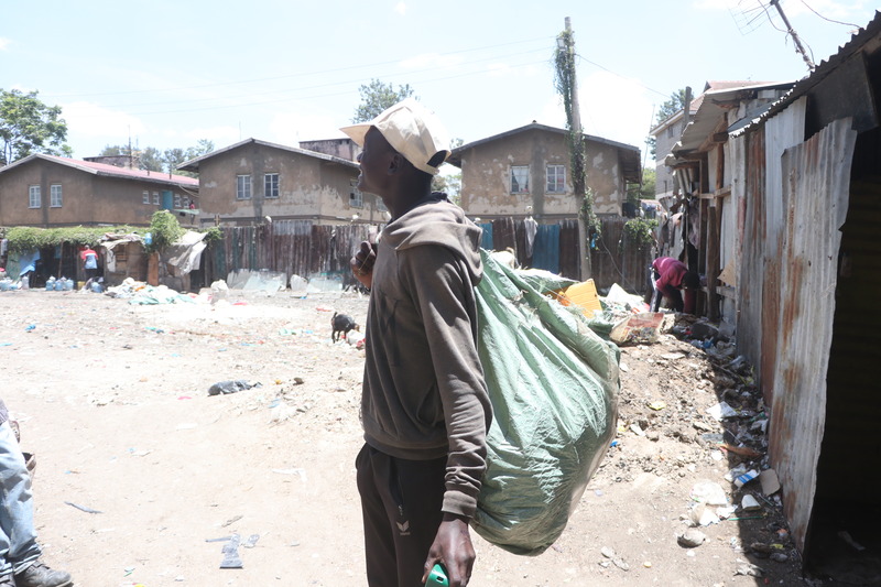 In the shadows: Street children in Eastleigh take on garbage collection jobs for survival