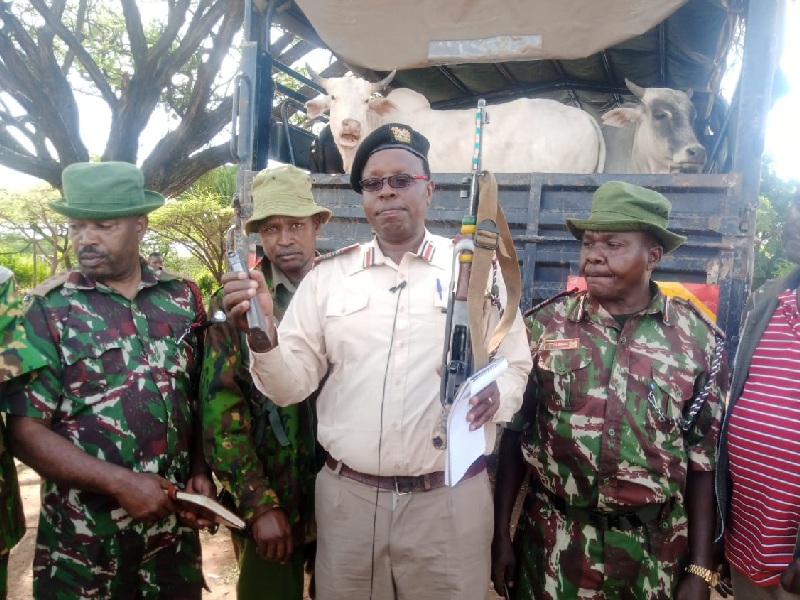 7 illegal firearms recovered after Samburu security operation - Samburu East Deputy County Commissioner Stanley Kimutai displays firearms recovered following a recent operation at Serolipi area, Samburu County where 15 cows stolen from Meru were recovered. (Photo: Waweru Wairimu/EV)