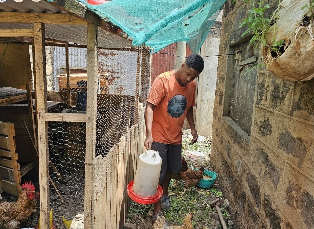 Teenager Zinedine Muthoka explores urban farming in bustling Eastleigh