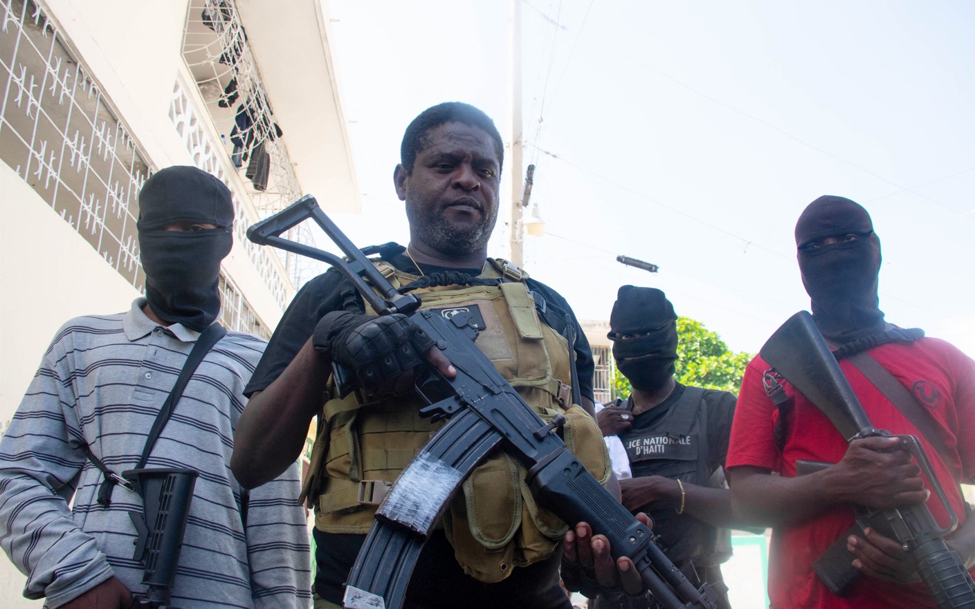 Haiti works at government transition as gang leader vows to fight on