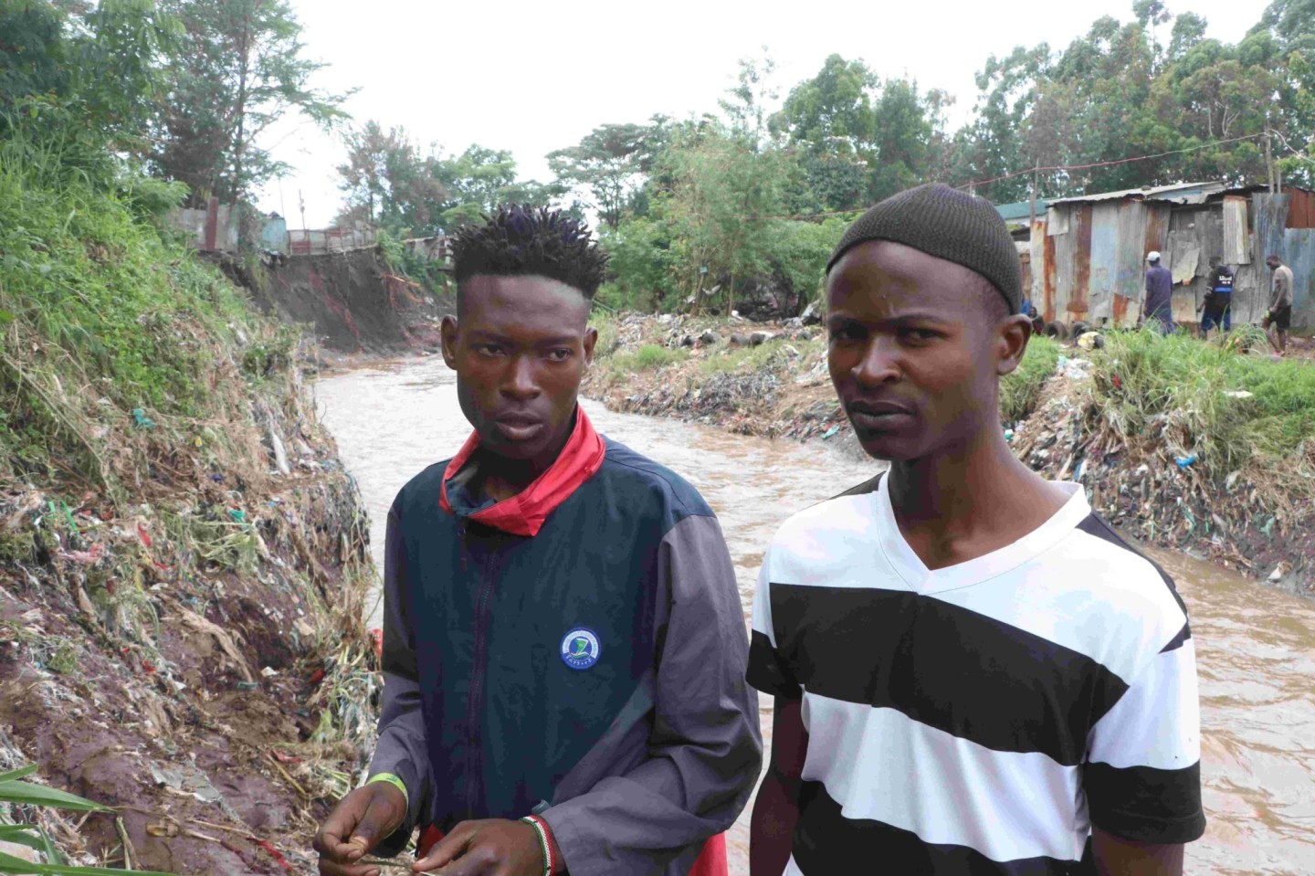 Nicholas Simiyu (left) and Stephen Ochami renowned for being divers in Kiambiu village, Kamukunji. (Photo/Justin Ondieki) 
