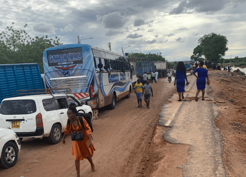 Passengers stranded after the River Tana floodwaters destroyed a section of the crucial roadway in April 2024 (Photo: Issa Hussein)