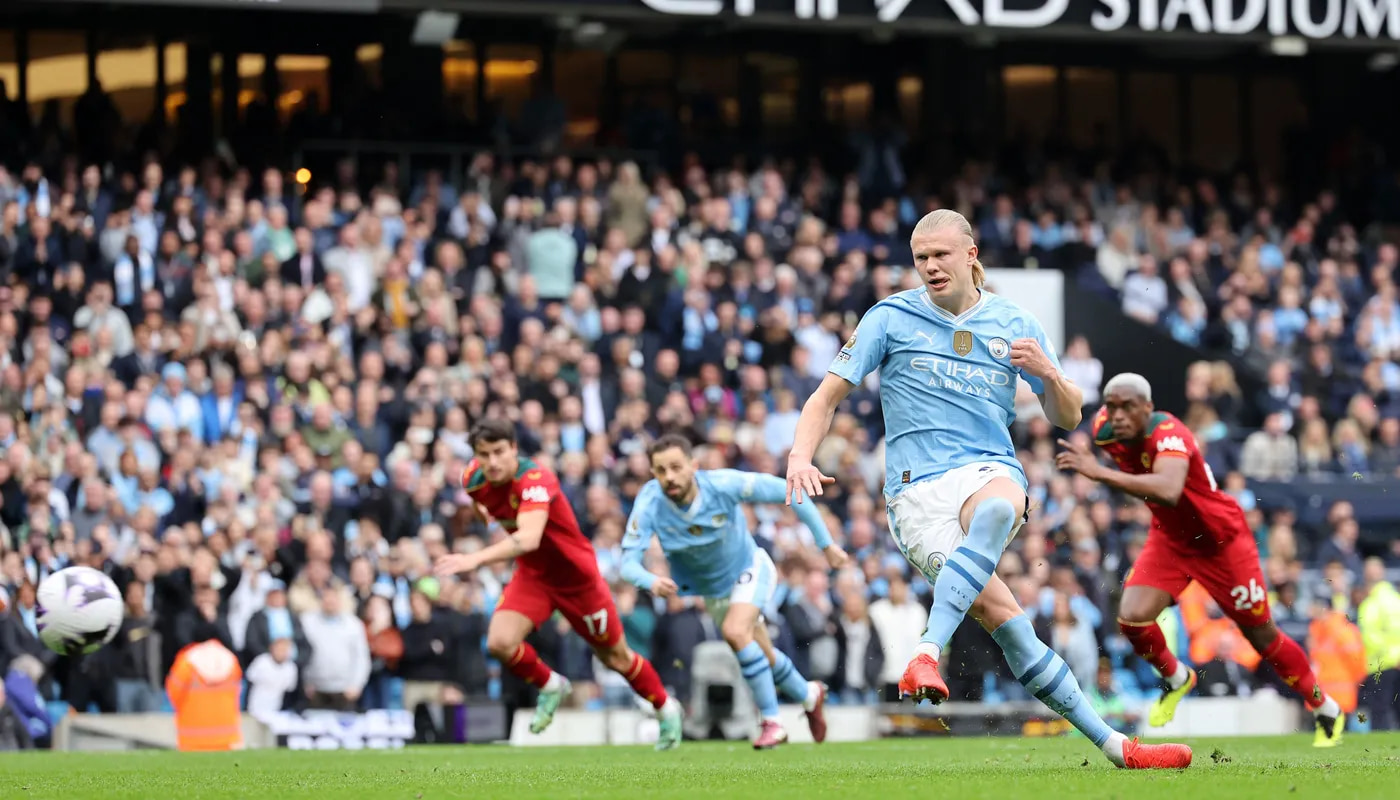 Haaland hits four as Man City close gap in title race