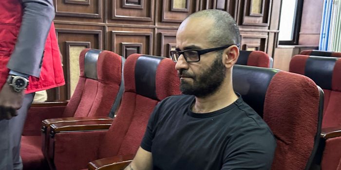 Nigeria court rules Binance executive can face trial on behalf of crypto exchange - Tigran Gambaryan, an executive of the Binance cryptocurrency exchange, waits to face prosecution for tax evasion and money laundering at the federal high court in Abuja, Nigeria, on April 4, 2024. (Photo: Abraham Achirga/Reuters)