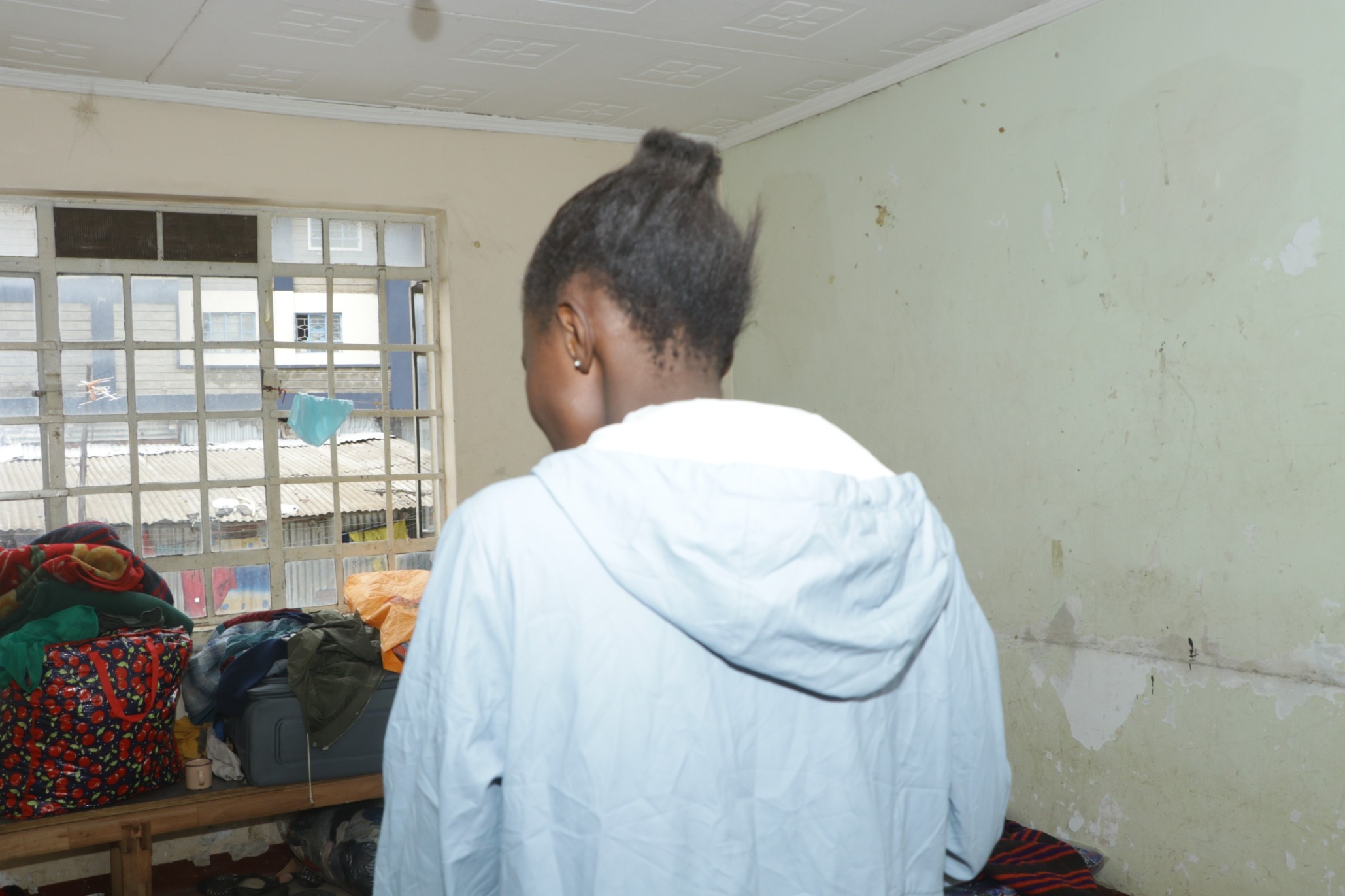 Mitchell Achieng, a Form Three seeking refuge at Twaweza Pamoja Camp in Mathare after her family was affected by floods in April 2024. (Photo: Justine Ondieki)