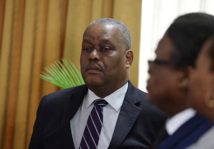 Haiti PM condemns killing of police officers in gang ambush - Garry Conille attends a ceremony with members of the transition council where he is presented as Haiti's interim Prime Minister, in Port-au-Prince, Haiti June 3, 2024. (Photo: REUTERS/Ralph Tedy Erol)