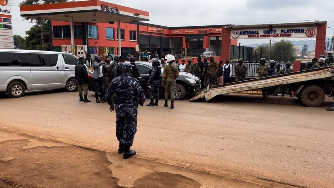 Security officers seen outside Bobi Wine's National Unity Platform Headquarters on Monday, July 22, 2024. (Photo: Bobi Wine)