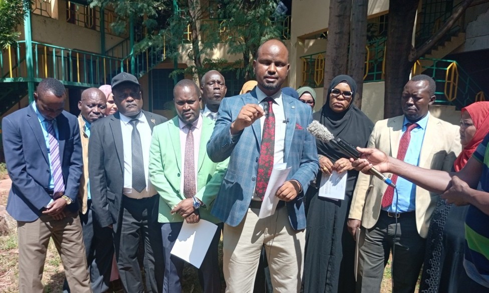 Isiolo County Assembly Majority Leader Abdirashid Ali and other MCAs address journalists at the County Assembly on July 24, 2024. PhotoWaweru Wairimu