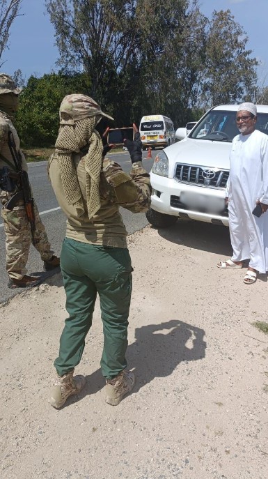 Muslim Human Rights Forum (MUHURI) director, Khelef Khalifa, interracts with the police in Malindi on Saturday, August 17, 2024. (Photo: Handout)