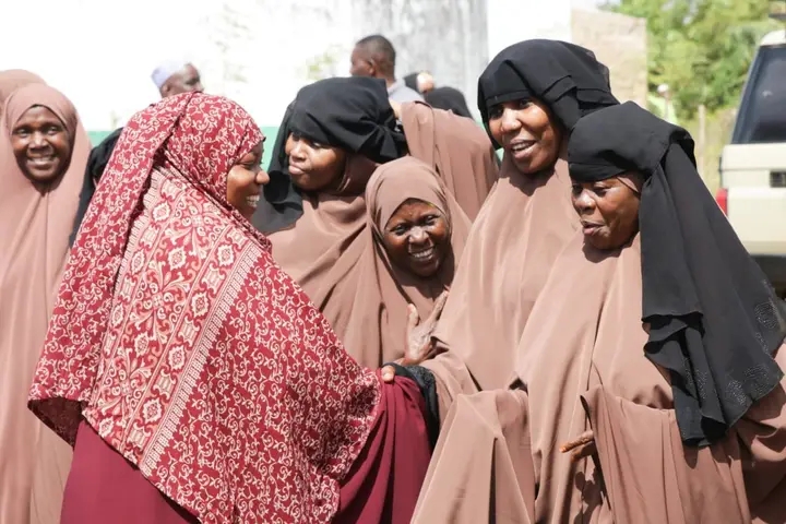 Kwale governor urges women to embrace religious studies for knowledge, empowerment - Women students welcome Kwale Governor Fatuma Achani (in a red headscarf) to Muungano Madrassa Hafla in Chiuriro in Msambweni on Sunday, August 18, 2024. (Photo: Mishi Gongo)