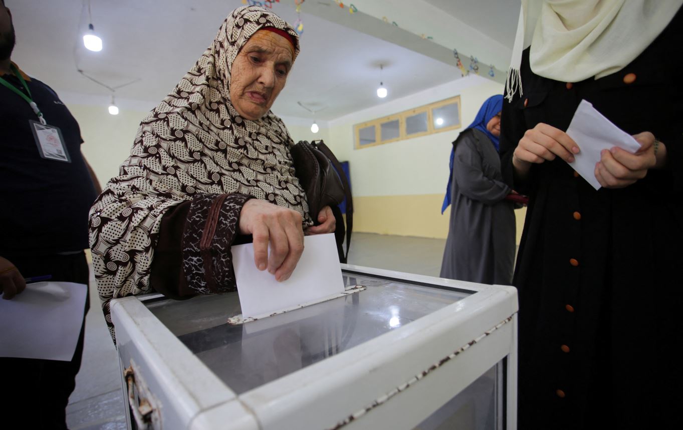 A woman casts her vote at a polling station during the presidential election in Algiers, Algeria September 7, 2024. (Photo: REUTERS/Ramzi Boudina)