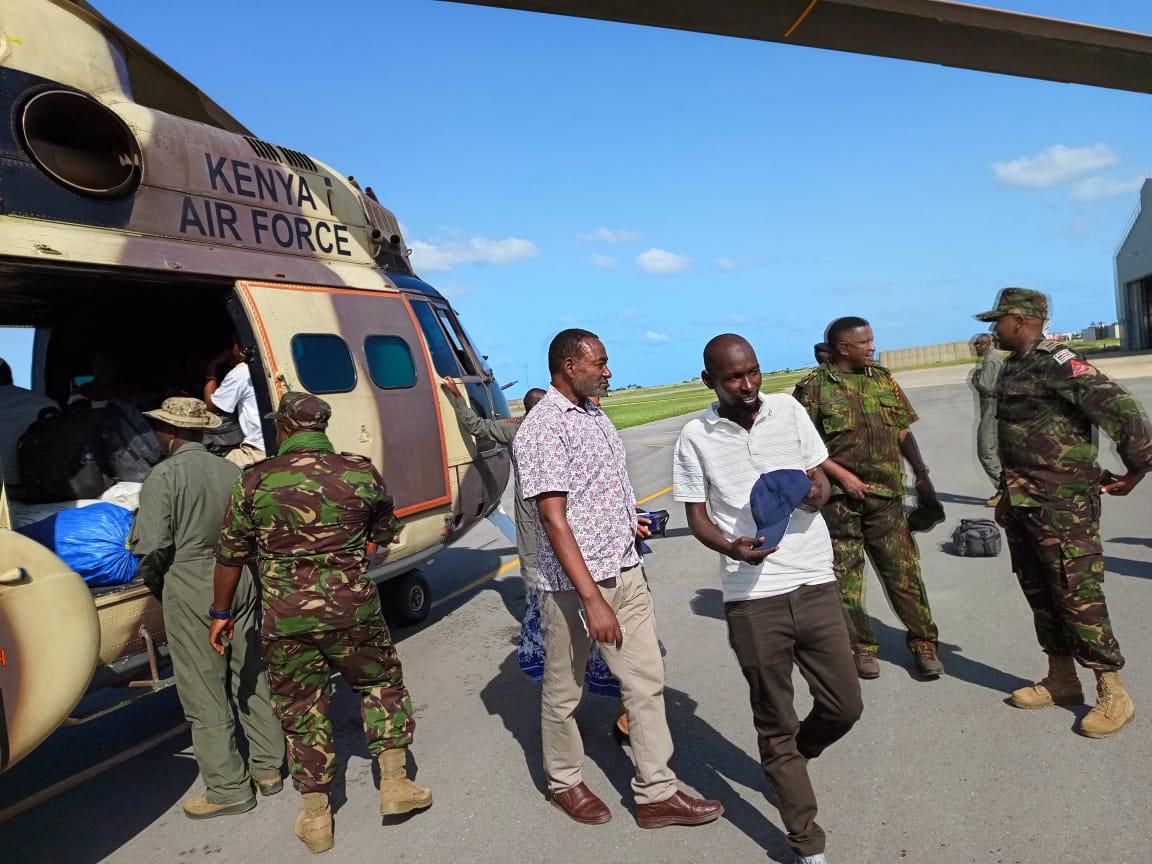 Boni forest teachers, education officials and the military interacting before they were airlifted by a military chopper to Boni Forest