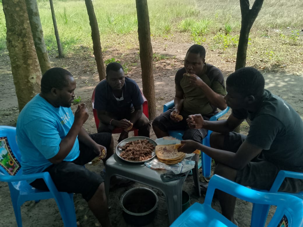 oni Forest teachers enjoying their meal at Mararani village in Boni Forest, Lamu East