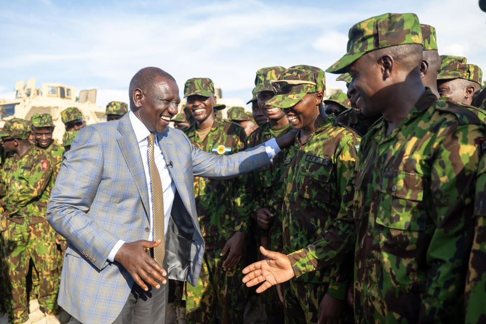 Kenyan taxpayers to foot Sh2.5 billion for Haiti mission in latest budget review - President William Ruto greets members of the Kenya Police after he arrived in Haiti to review security assistance at the Toussaint Louverture International Airport, in Port-au-Prince, Haiti, September 21, 2024. (Photo: PCS)