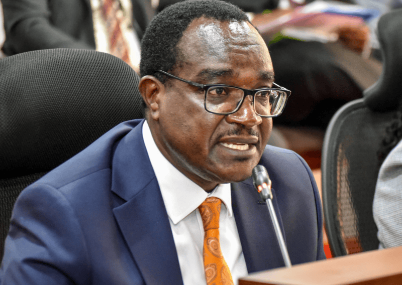 CS Ogamba: No varsity student will be barred from exams over unpaid fees - Education CS Julius Ogamba when he appeared before the Parliamentary Committee on Education led by Tinderet MP Hon. Julius Melly to address a number of issues raised by legislators on matters education.