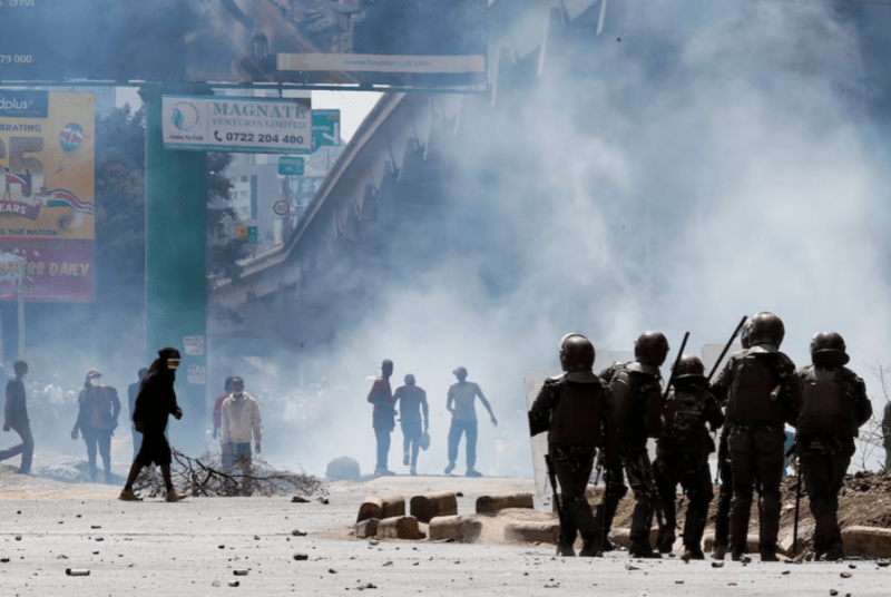 Kenyan police in plainclothes fired on Nairobi protesters, Amnesty says - Riot police members operate during a demonstration against Kenya's proposed finance bill 2024/2025 in Nairobi, Kenya, June 25, 2024. (Reuters)