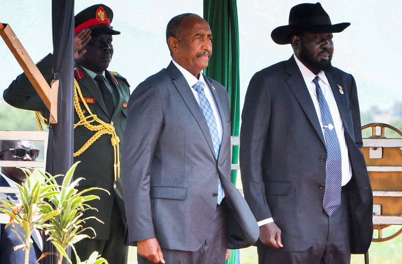 South Sudan lawyers challenge the postponement of elections in court - Sudan's Sovereign Council Chief General Abdel Fattah al-Burhan stands with South Sudanese President Salva Kiir upon arriving at the Juba International Airport, in Juba, South Sudan September 16, 2024. (Photo: REUTERS/Jok Solomun/File Photo) 