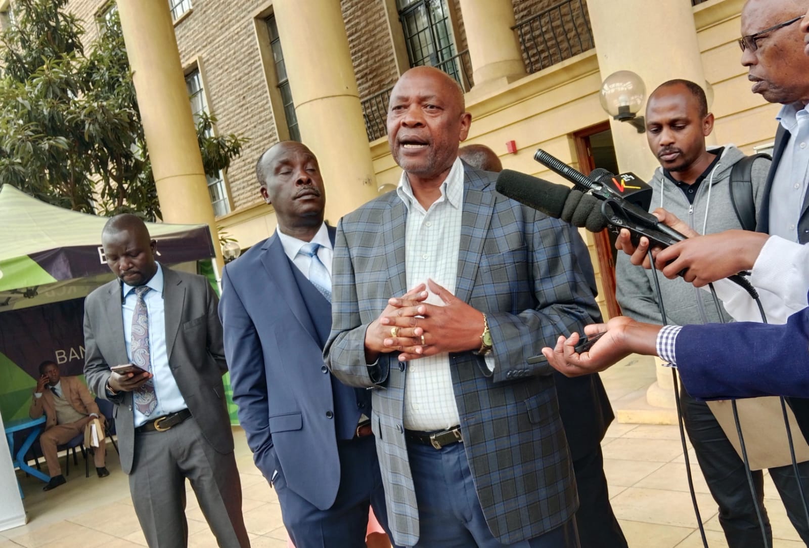 Court clears path for modern housing units in Nairobi’s Woodley estate - Woodley Residents Welfare Association Vice Chairman Tirus Kimani speaking to journalists at the Milimani Law Courts on September 17, 2024. (Photo: Joseph Ndunda)