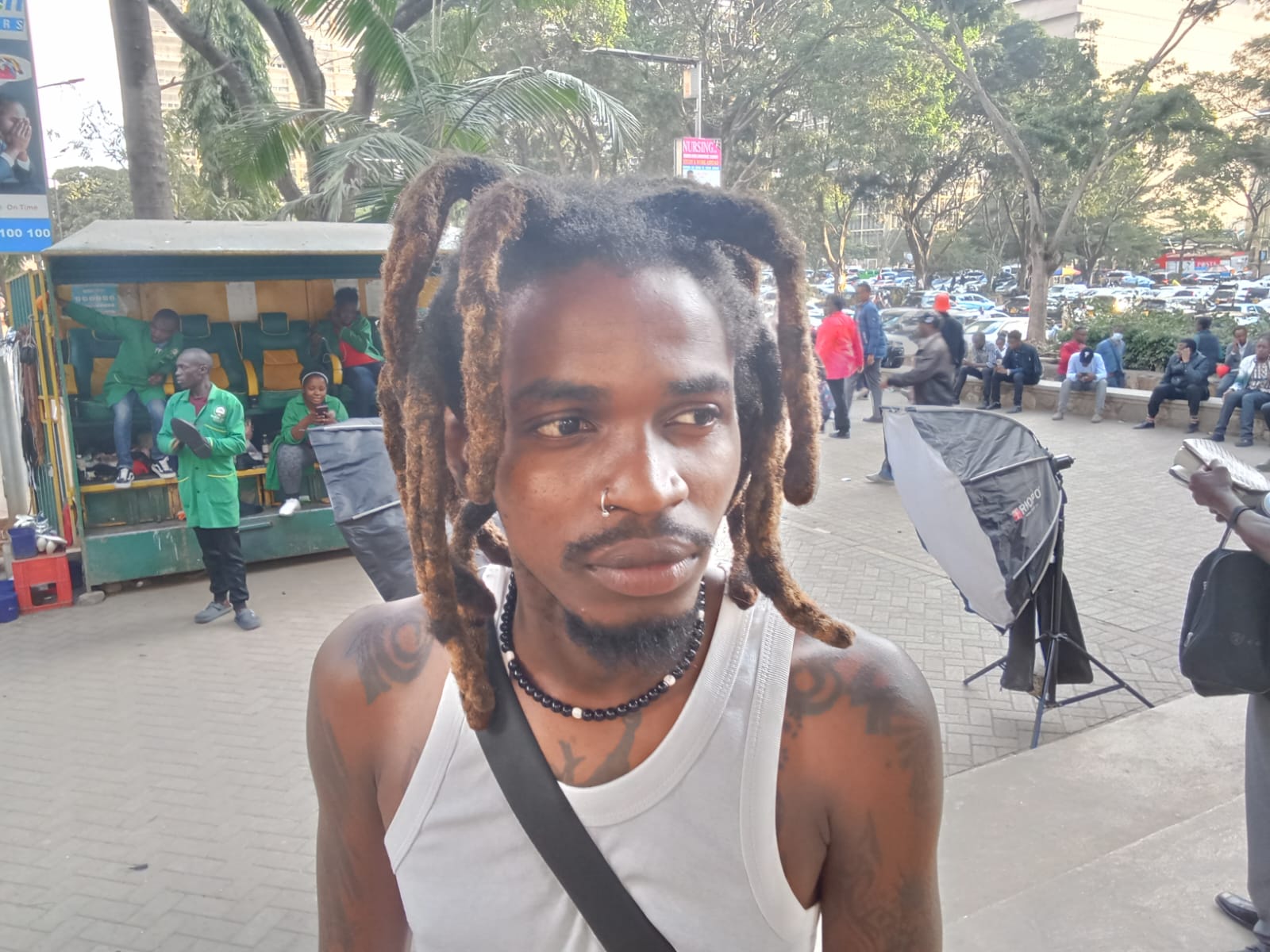 Street photographer Brian Wainaina at his work place along Agha Khan Walk in Nairobi. (Photo: Barack Oduor)