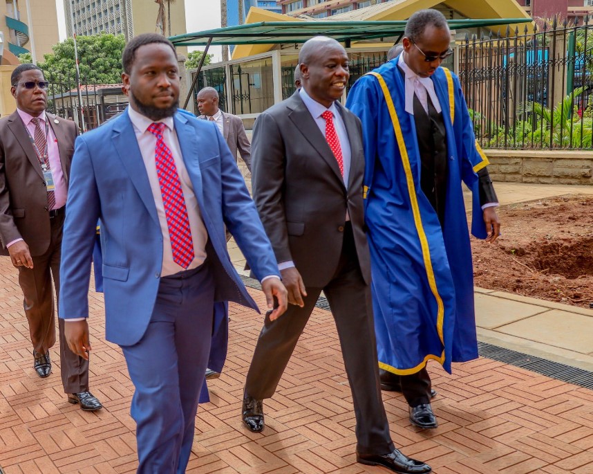 The rise and fall of Kenya’s second deputy president Rigathi Gachagua - Rigathi Gachagua (2nd left) arrives in Parliament escorted by Senate officers on October 16, 2024 for his impeachment hearing. (Photo: Senate of Kenya)