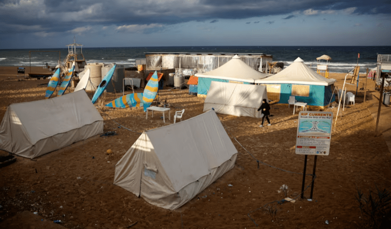 As Israeli jets hit Beirut, people flee to sleep on the beach