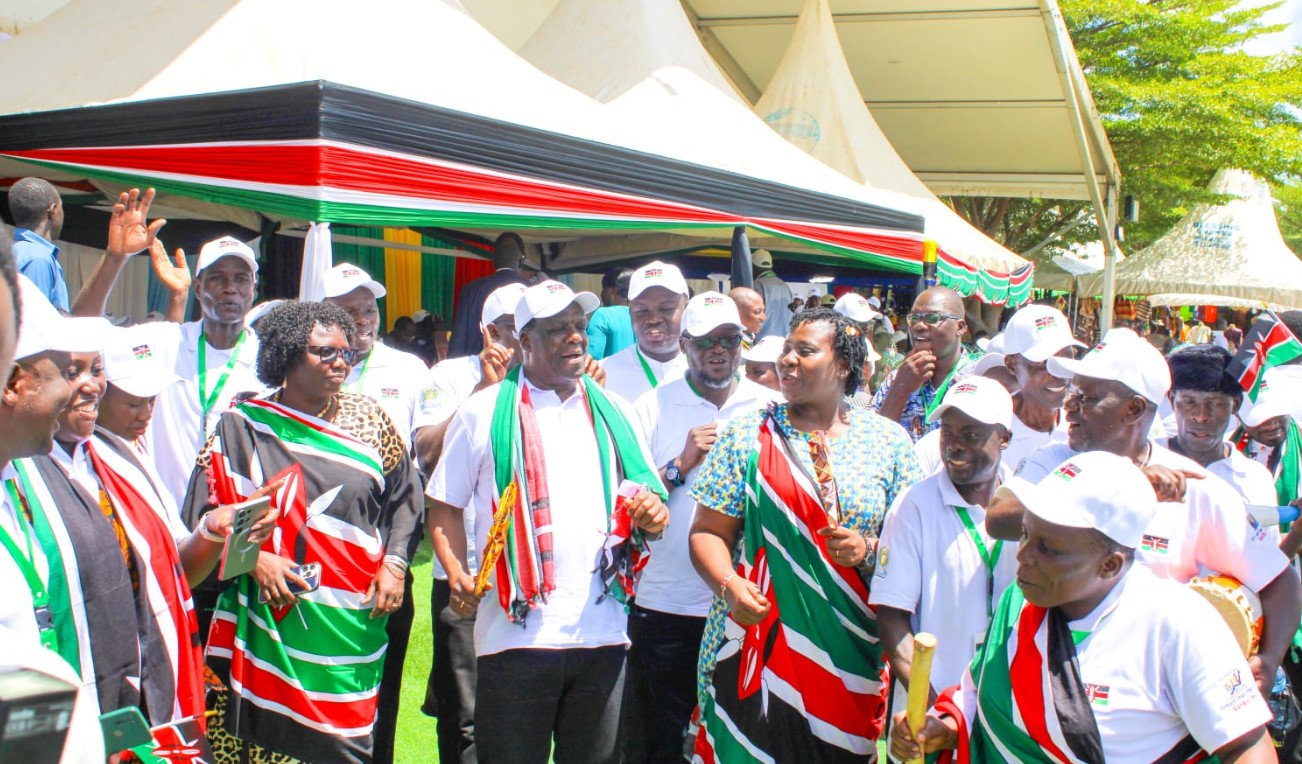 Cabinet Secretary Wycliffe Oparanya joins Kenyans in dance during Kenya Day celebrations at the EAC MSMEs Trade Fair in Juba, South Sudan on Tuesday, Ocotober 29, 2024. (Photo: Handout)