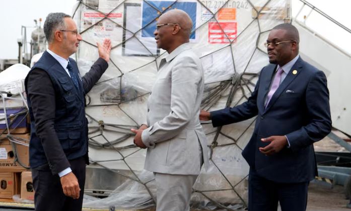 Africa health body calls on Trump to honour US vaccine pledges - HERA Director General Laurent Muschel presents mpox vaccines to the DR Congo's Health Minister Samuel Roger Kamba Mulamba on September 5, 2024 as Africa CDC Director General Jean Kaseya looks on. (Photo: File/REUTERS/Justin Makangara)