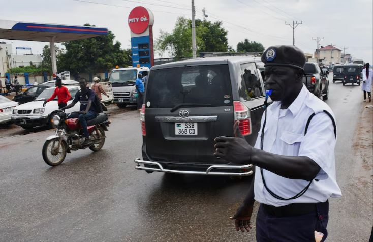 Calm restored in Juba after soldiers' clash at ex-intelligence chief's home - A traffic police officer controls motorists along a street in Juba following a night of gunfire after security forces moved to arrest the former head of the intelligence service, in Juba, South Sudan November 22, 2024. (Photo: REUTERS/Samir Bol)