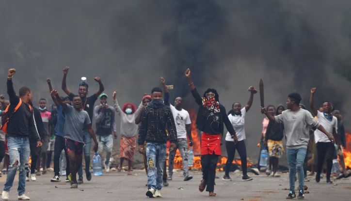 Mozambique police fire tear gas at biggest protest yet against Frelimo