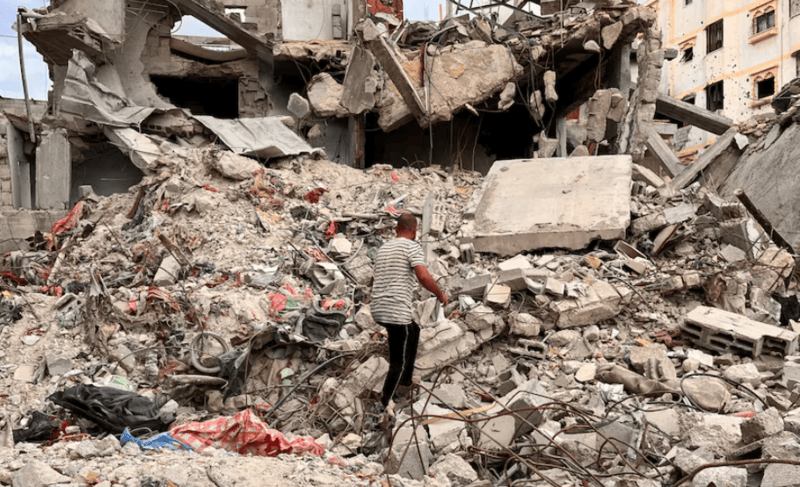 Desperate for cash, Gazans sell clothes plucked from rubble