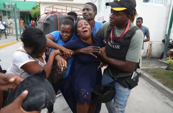 Armed men fire on Haiti hospital reopening, killing at least 3