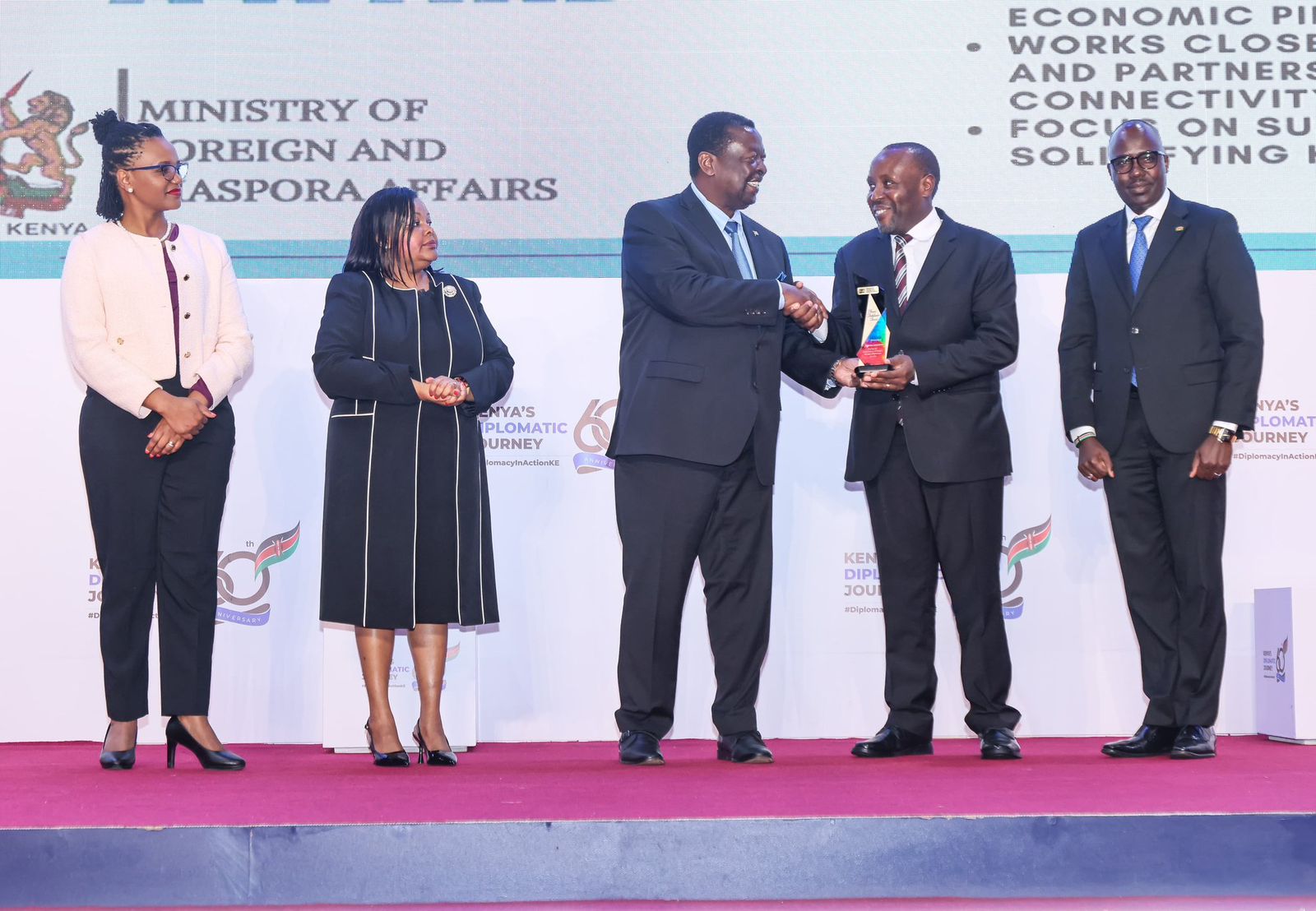 National icons honoured during 60th anniversary of Kenya's diplomatic journey - PCS Musalia Mudavadi honours Kenya Airways CEO Allan Kilavuka on December 2, 2024 in Nairobi. 