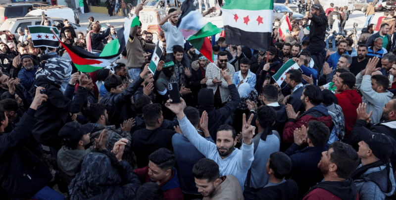 Syrian rebels topple President Assad, Russia says he left the country - People celebrate, after Syrian rebels announced that they have ousted President Bashar al-Assad, at Majdal Anjar in Bekaa, Lebanon, December 8, 2024. (Reuters)