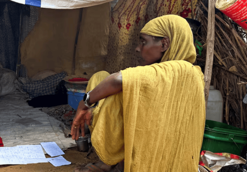 Sudan's RSF says seizes back control of key Darfur base from army allies - A displaced Sudanese woman rests inside a shelter at Zamzam camp, in North Darfur, Sudan, August 1, 2024. (REUTERS)