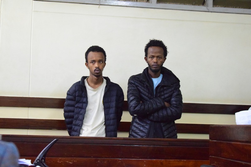 Two men face charges over violent robberies in Eastleigh - Mohamed Abdikadir Omar and Abdikarim Mohamed Ali in the dock at the Makadara Law Courts. (Photo: Joseph Ndunda, EV) 