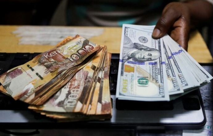 Analysis: Kenyan shilling marks first year-on-year gain in four years in 2024 - US dollar banknotes and Kenya shilling banknotes at a forex exchange bureau in Nairobi. (Photo: REUTERS/Thomas Mukoya)