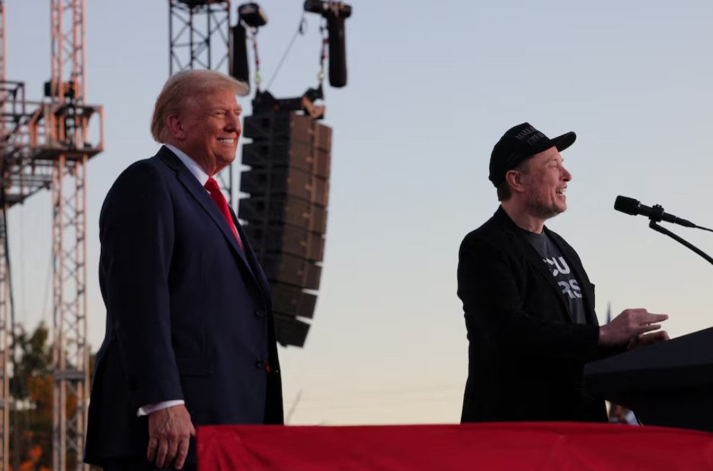 Elon Musk now has an office in the White House. What’s his political game plan? - Tesla CEO and X owner Elon Musk (right) speaks as Donald Trump looks on during a rally in Butler, Pennsylvania, US on October 5, 2024. (Photo: REUTERS/Brian Snyder)