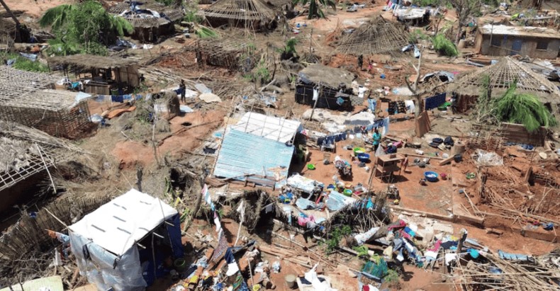 Climate change, conflict and political unrest: Mozambique’s triple crisis explained - People stand amid destroyed buildings, uprooted trees and debris after cyclone Chido hit Mozambique, in Mecufi district, Cabo Delgado province on December 16, 2024. (Photo: Unicef Mozambique/Handout via REUTERS.)