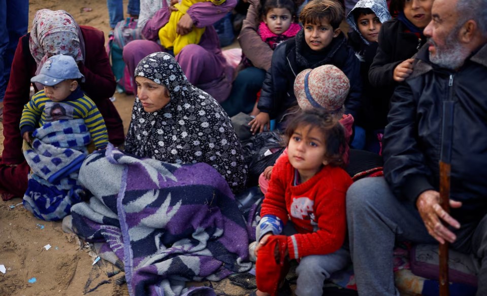 Trump calls for removal of 1.5 million people displaced by Gaza conflict - Palestinians wait on January 26, 2025 to be allowed to return to their homes in northern Gaza after they were displaced to the south at Israel's order during the war. (Photo: REUTERS/Mohammed Salem)