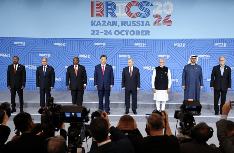 Uganda officially joins BRICS, marking a new era of global collaboration - BRICS leaders pose before a plenary session of the 2024 summit in Kazan, Russia. (Reuters)