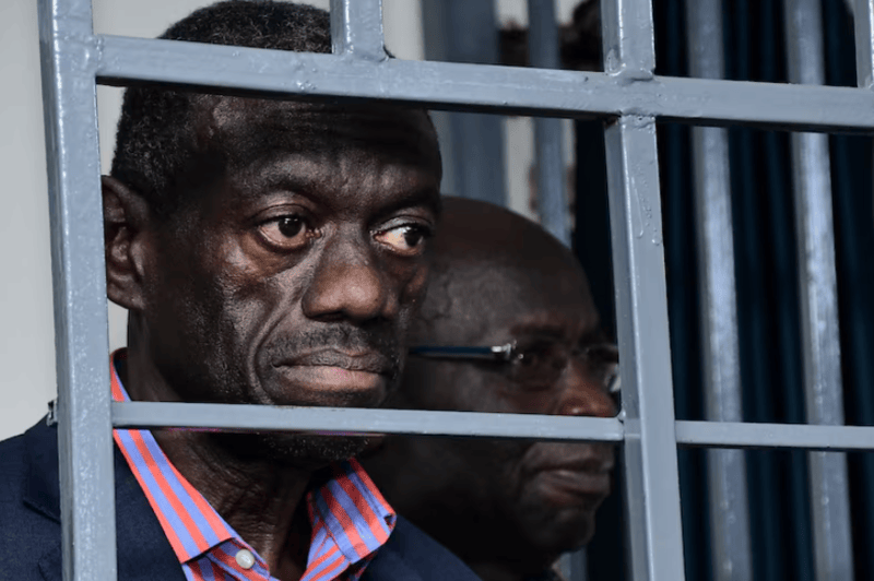 Besigye's wife speaks out on his fragile health in prison - Ugandan four-time presidential aspirant Kizza Besigye and his colleague Obeid Lutale stand in the steel dock at the Uganda Military General Court Martial in Makindye suburb of Kampala, Uganda November 20, 2024. (Photo: REUTERS)